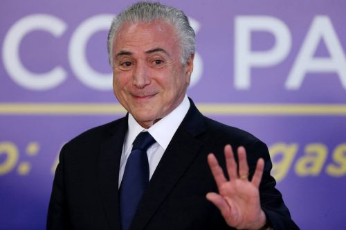 Brazil’s President Michel Temer waves during a ceremony at the Planalto Palace in Brasilia